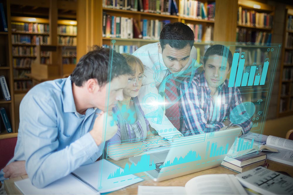 digital representation pie chart against mature students with teacher laptop library